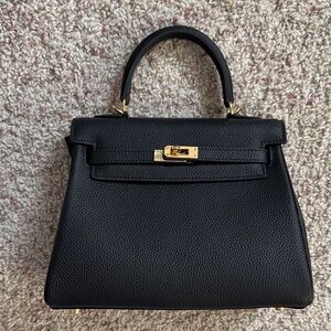 Chic Black Satchel with Gold Accents